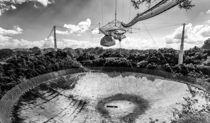 The world's largest and most sensitive radiotelescope is located in Arecibo, Puerto Rico. You can learn about this amazing feat of engineering and science here. 